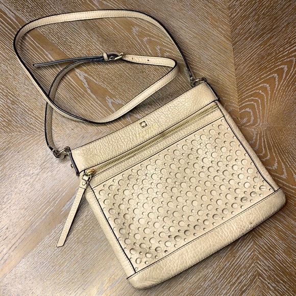 kate spade Handbags - KATE SPADE Cream Lasercut Crossbody Bag
